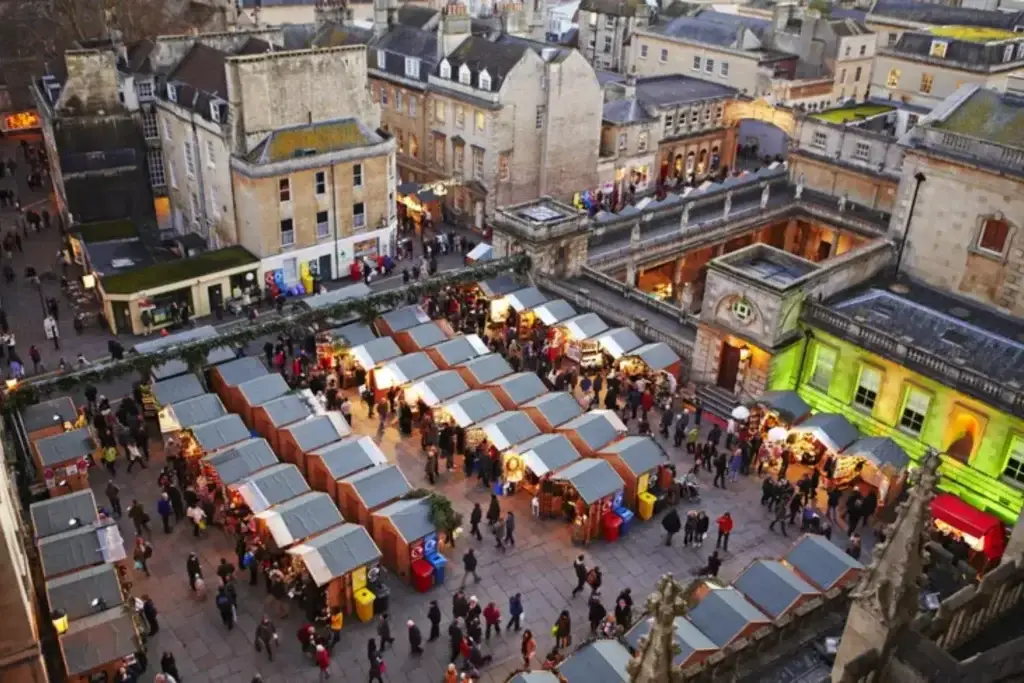 Crowds of people at the Christmas market in Bath, a city famous for its ancient Roman baths