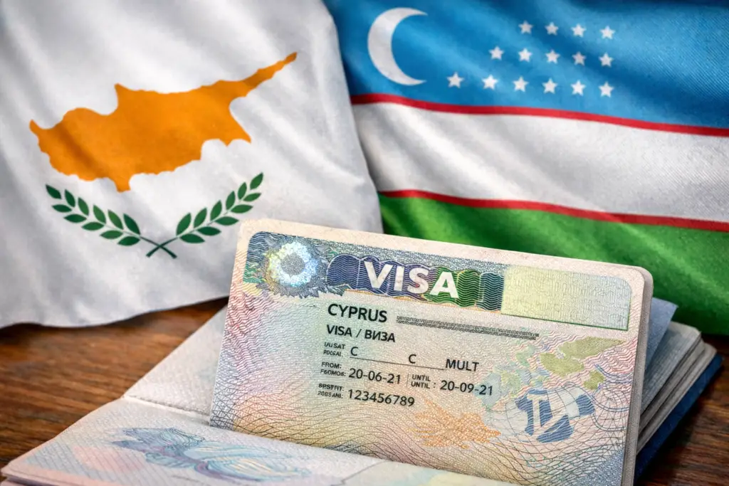 Visa on the background of the flags of the Republic of Cyprus and the Republic of Uzbekistan