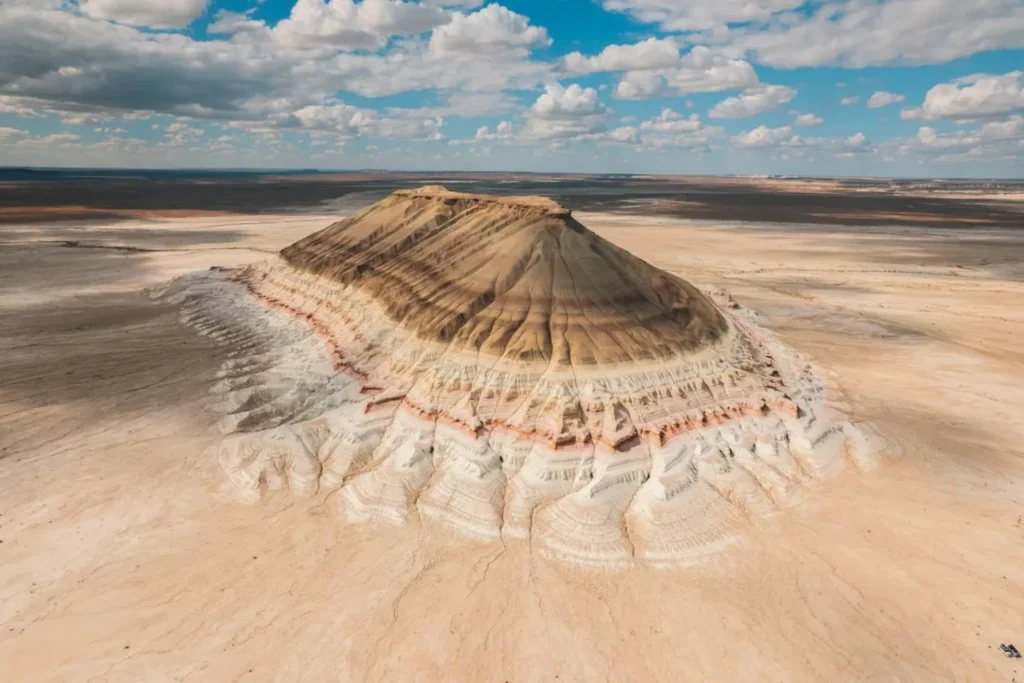 Mount Bokty rises above the flat surface like a huge clay table