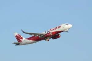 The airplane is flying in the sky