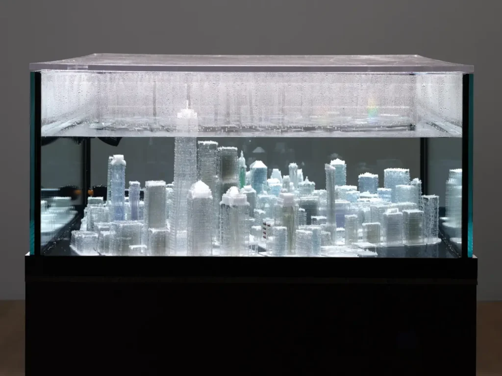 Glass vessels displayed inside a transparent installation, part of Xin Liu’s artwork “The Permanent and Insatiable,” New York, 2025.