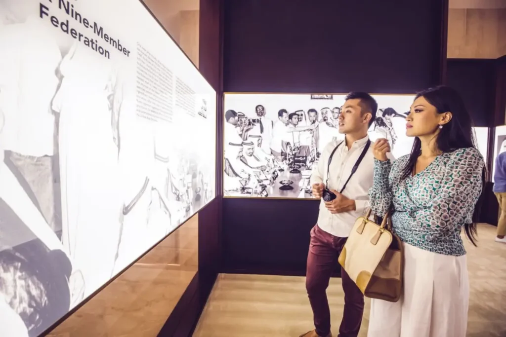 Visitors exploring an exhibition inside the Etihad Museum in Dubai